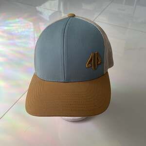 Blue and Brown Baseball Hat with Mesh Back, Embroidered Logo